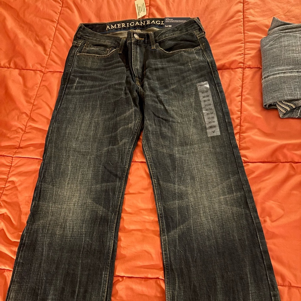 American Eagle Men’s Boot Cut Jeans New with Tags! 30x30 dark denim in color.